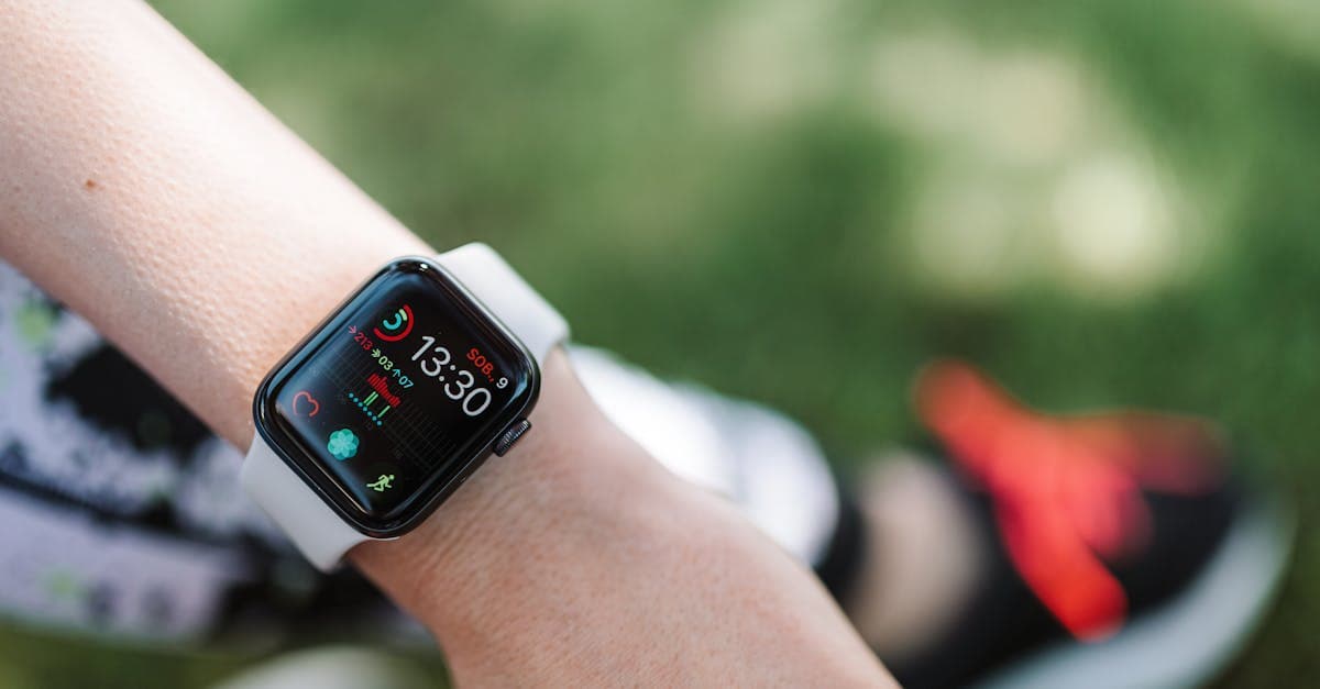 A close-up of a smartwatch displaying health metrics like heart rate, demonstrating a key biohacking tool.