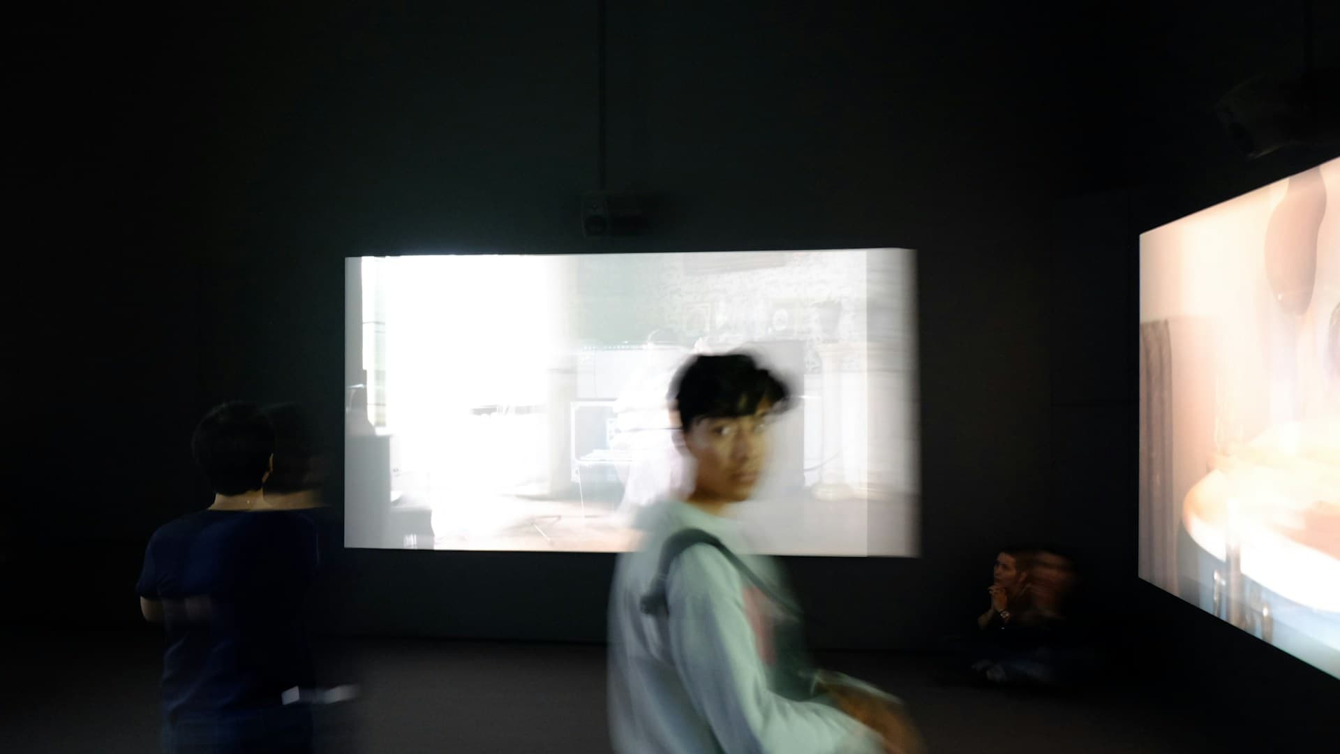 Person interacting with a digital mental health interface superimposed on a neural graphic