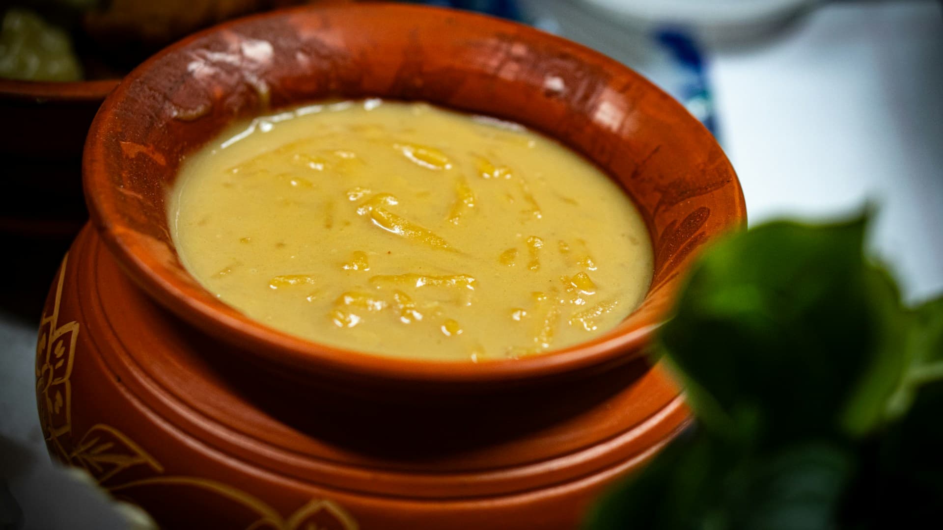 A bright and silky bowl of Greek lemon chicken soup (Avgolemono) garnished with fresh dill.
