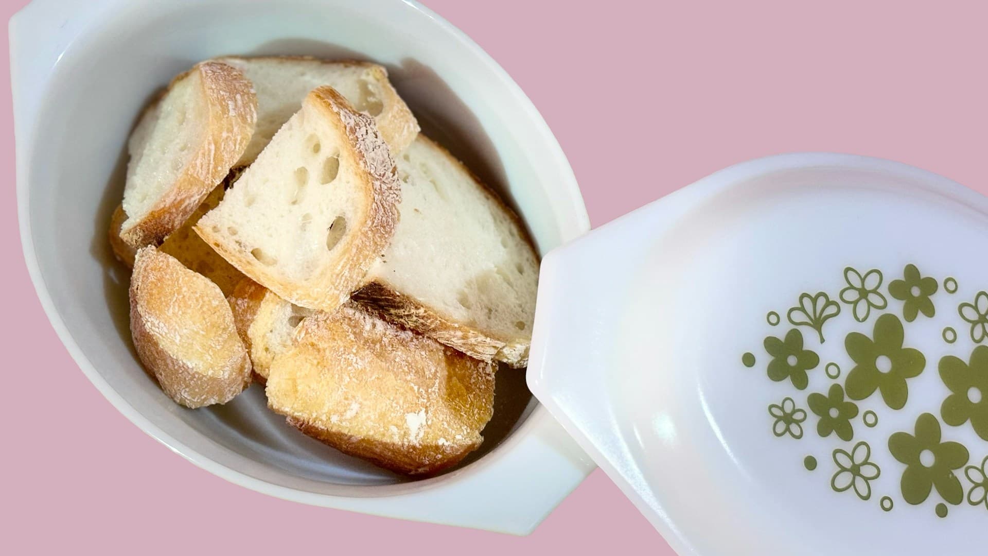 A rustic bowl of Tuscan white bean and kale soup with a side of crusty bread.