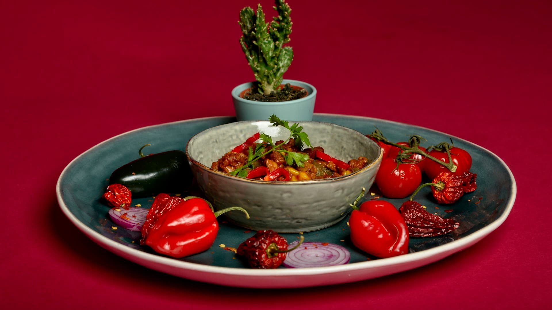 A vibrant, colourful plate of healthy Mediterranean tacos filled with chicken, fresh vegetables, and tzatziki sauce.